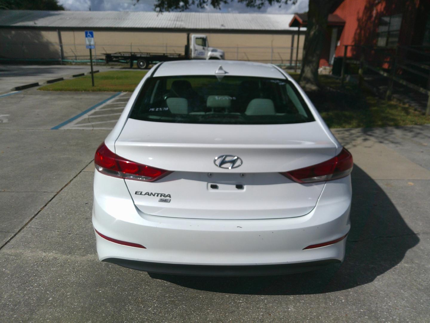 2017 WHITE HYUNDAI ELANTRA LIMITED; SE (5NPD74LF2HH) , located at 1200 Cassat Avenue, Jacksonville, FL, 32205, (904) 695-1885, 30.302404, -81.731033 - Photo#5